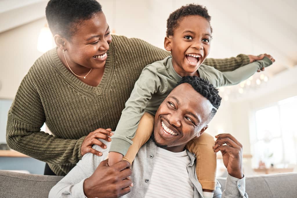 Older couple reviewing the details of a whole of life insurance policy at home