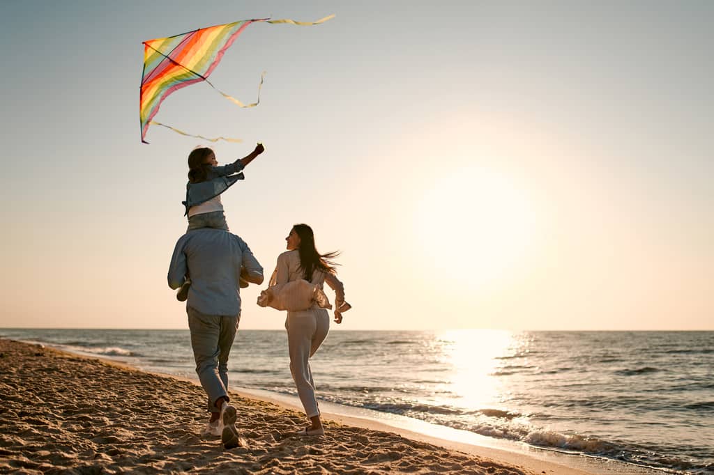 Couple learning what life insurance is during a meeting with an adviser